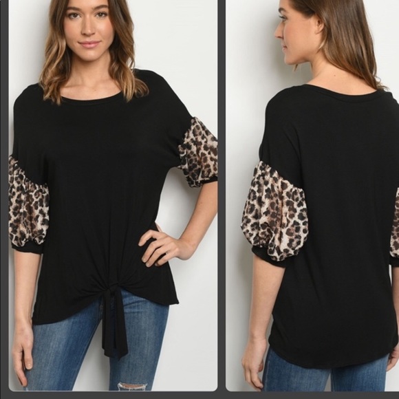 A Girl Thing Tops - Black top with leopard sleeves new without tags.